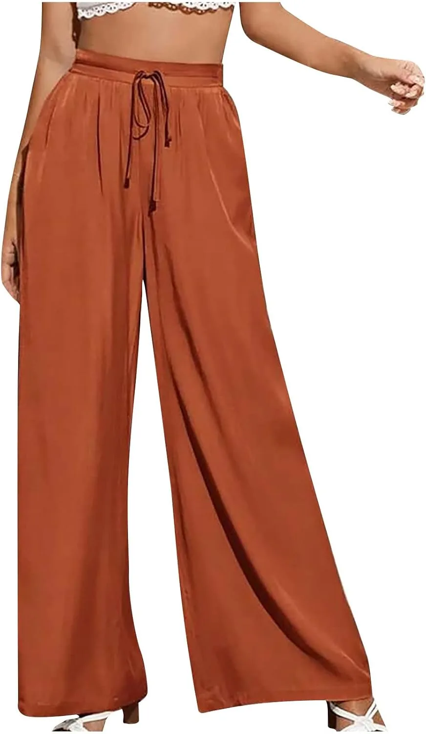 Женские брюки палаццо с высокой талией и широкими штанинами
Женские брюки палаццо с высокой талией и широкими штанинами