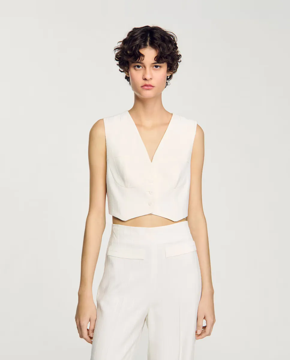 Короткий женский жилет с пайетками Sandro, белый
Короткий женский жилет с пайетками Sandro, белый