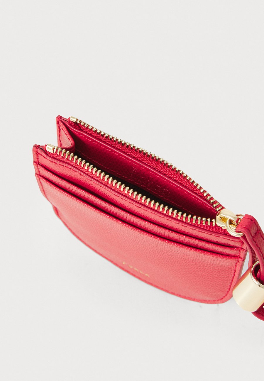 Кошелек Furla LAURA ROUND CARD CASE STRAP, Ruby/Dark Red
Кошелек Furla LAURA ROUND CARD CASE STRAP, Ruby/Dark Red