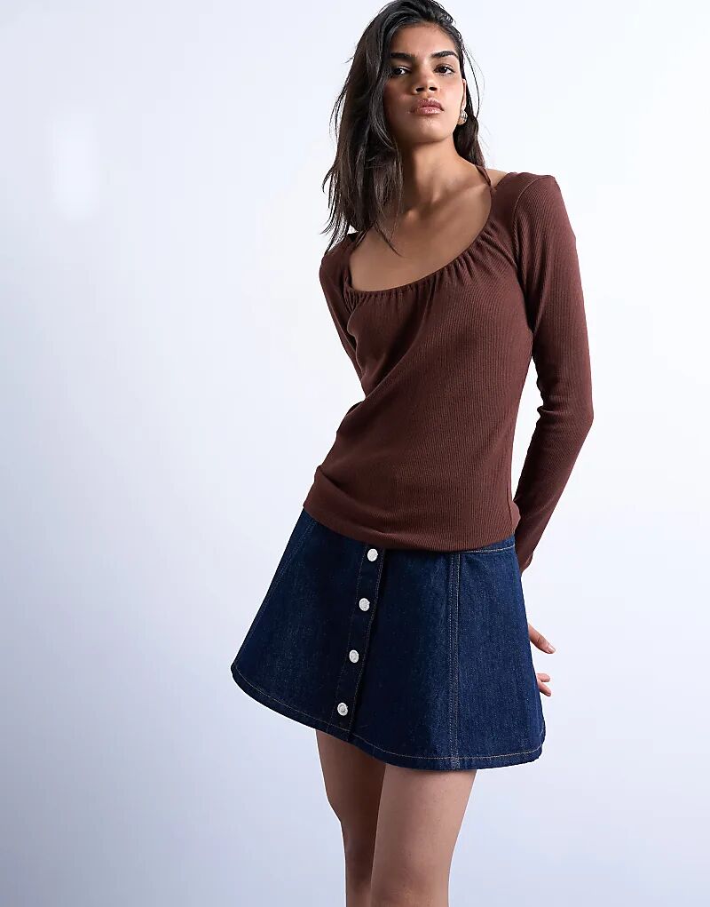 Мини-юбка из денима Topshop цвета индиго с пуговицами
Мини-юбка из денима Topshop цвета индиго с пуговицами