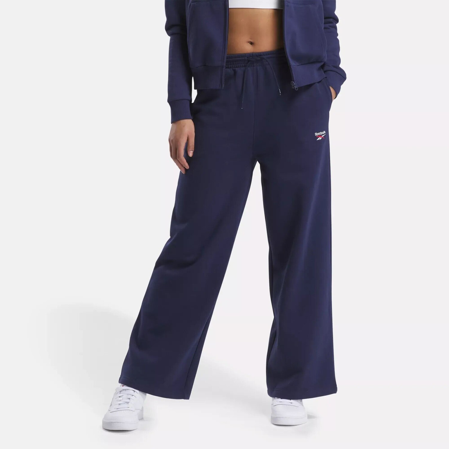 Широкие флисовые брюки Identity Reebok, индиго
Широкие флисовые брюки Identity Reebok, индиго