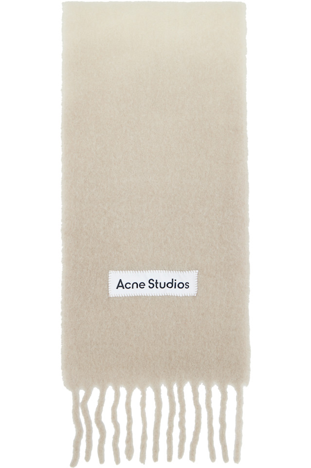 Acne Studios Бежевый шерстяной шарф с бахромой
Acne Studios Бежевый шерстяной шарф с бахромой