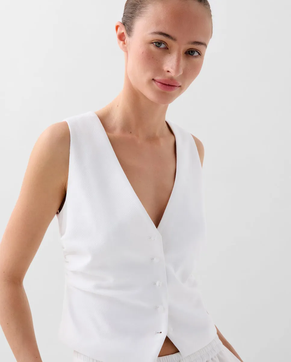 Женский жилет с V-образным вырезом и застежкой на пуговицы Scalpers, белый
Женский жилет с V-образным вырезом и застежкой на пуговицы Scalpers, белый