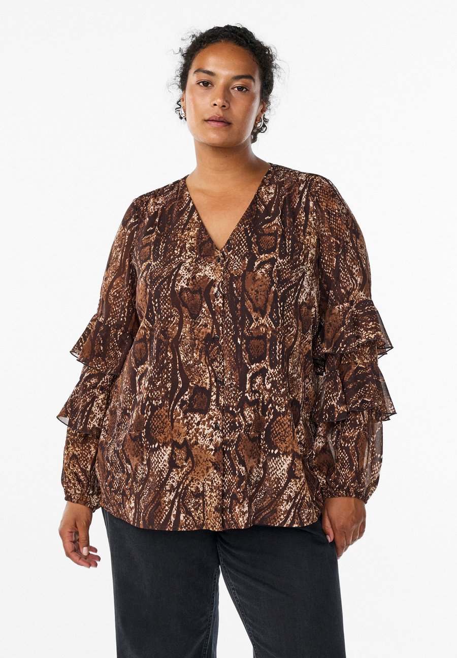 Блуза Zizzi MIT ANIMAL UND RÜSCHEN, Brown Snake Aop/Brown
Блуза Zizzi MIT ANIMAL UND RÜSCHEN, Brown Snake Aop/Brown