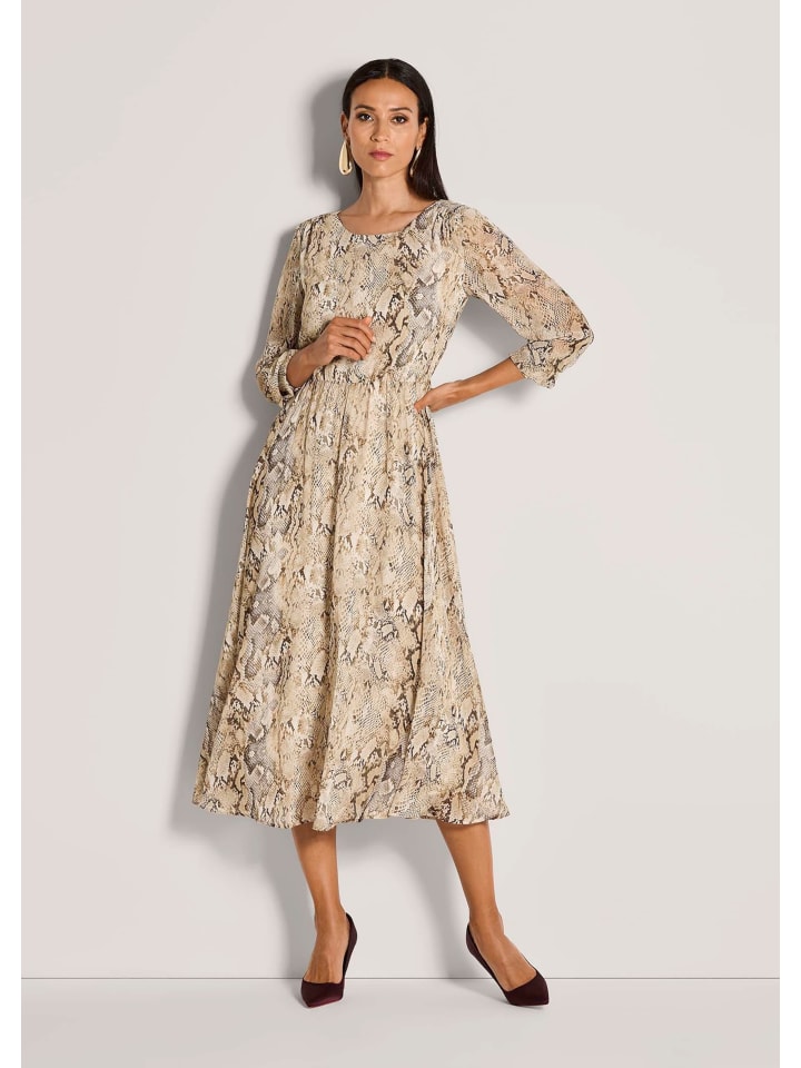 MADELEINE Элегантное платье с анималистическим принтом карамельно-бежевого цвета
MADELEINE Элегантное платье с анималистическим принтом карамельно-бежевого цвета