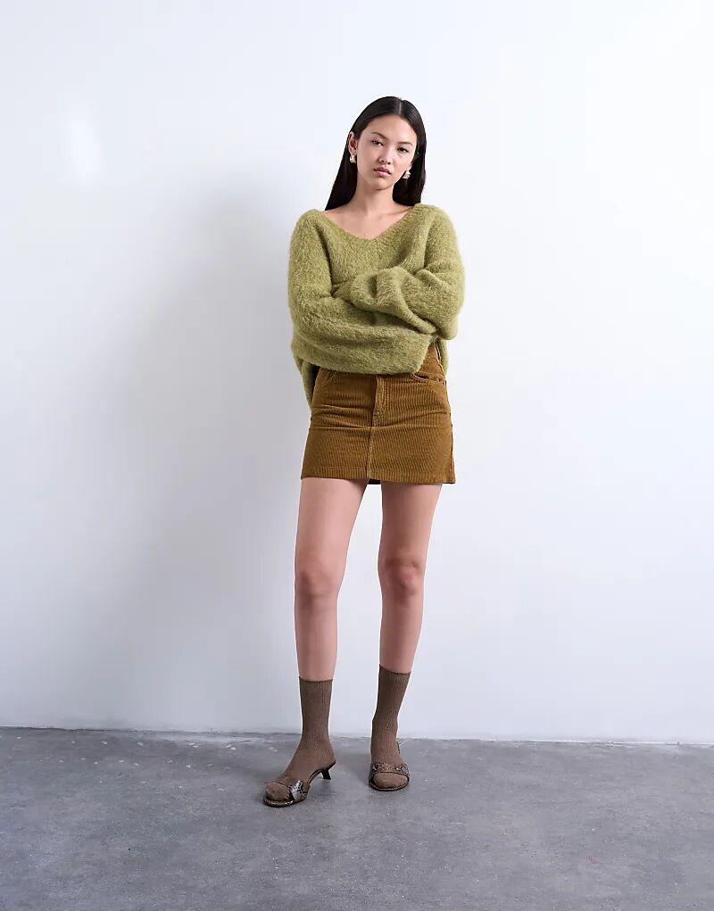 Юбка-мини с вельветовым ламбрекеном Topshop медового цвета
Юбка-мини с вельветовым ламбрекеном Topshop медового цвета