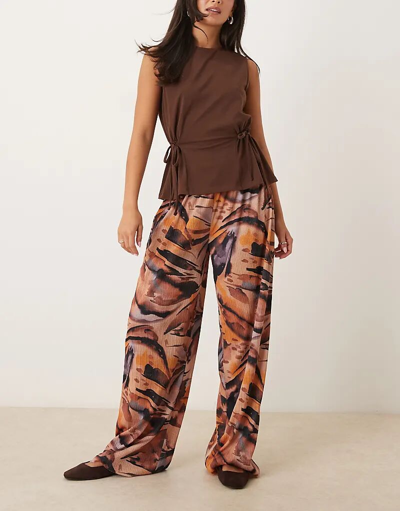 Широкие брюки ASOS DESIGN с плиссировкой и оранжевым мраморным принтом
Широкие брюки ASOS DESIGN с плиссировкой и оранжевым мраморным принтом
