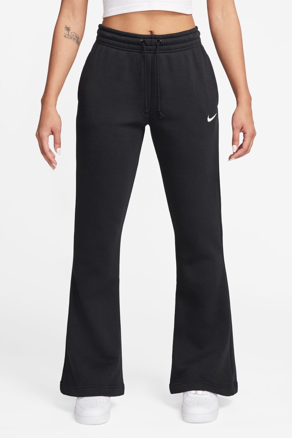 Расклешенные брюки джоггеры Phoenix из флиса со средней посадкой Nike, черный
Расклешенные брюки джоггеры Phoenix из флиса со средней посадкой Nike, черный