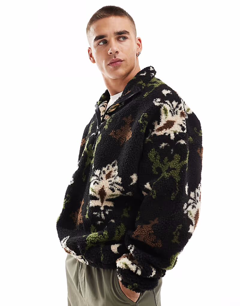 Плотный флис с принтом «борг» на молнии четвертного отрезка черного цвета от Jack & Jones
Плотный флис с принтом «борг» на молнии четвертного отрезка черного цвета от Jack & Jones