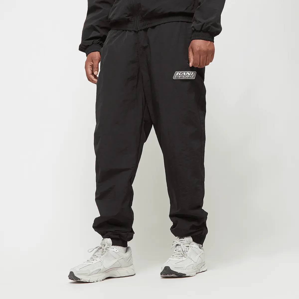 Спортивные брюки Karl Kani Sport Patch Essential Trackpants, черный
Спортивные брюки Karl Kani Sport Patch Essential Trackpants, черный