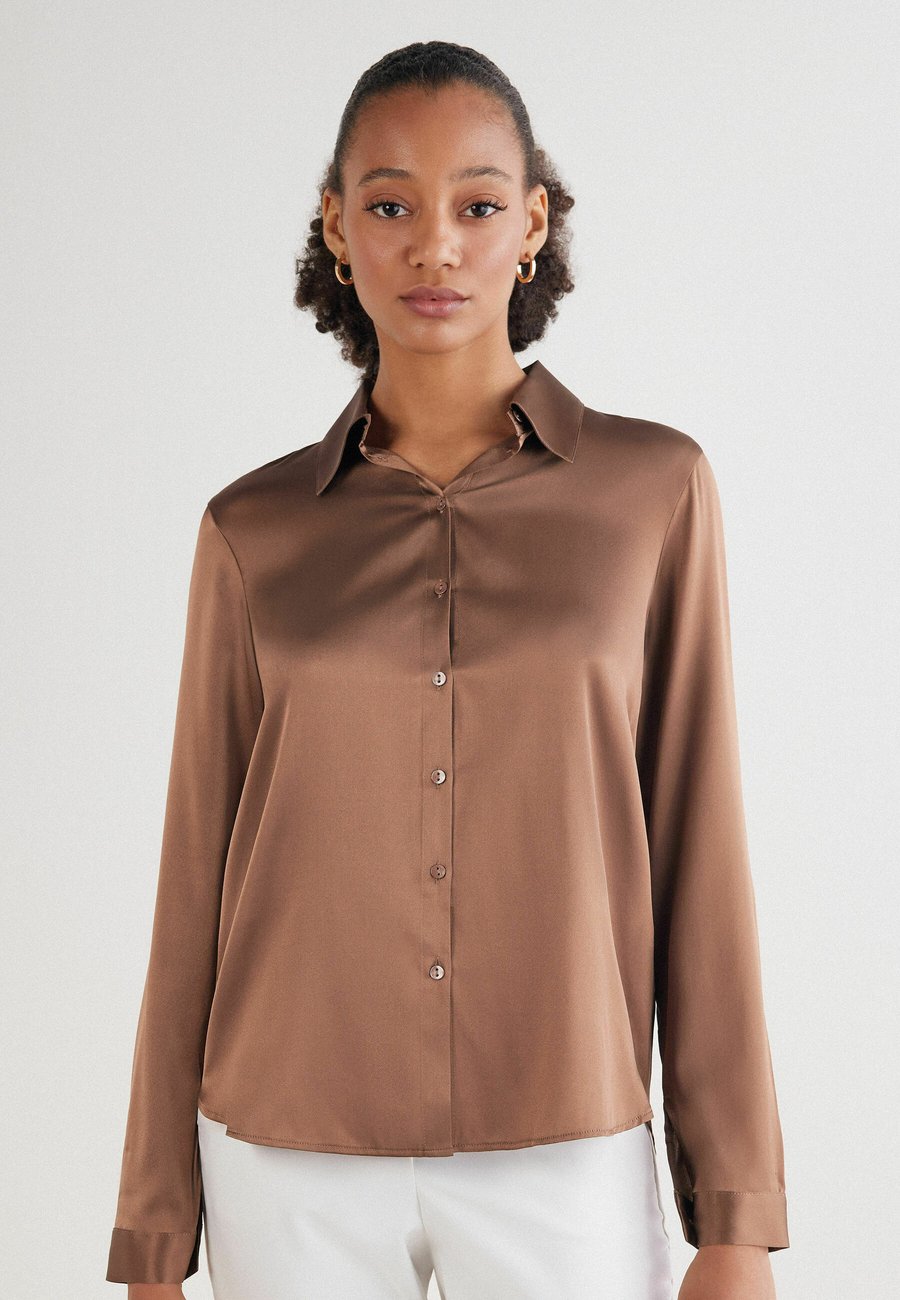 Блуза Intimissimi Button-down blouse, Natural/Camel
Блуза Intimissimi Button-down blouse, Natural/Camel