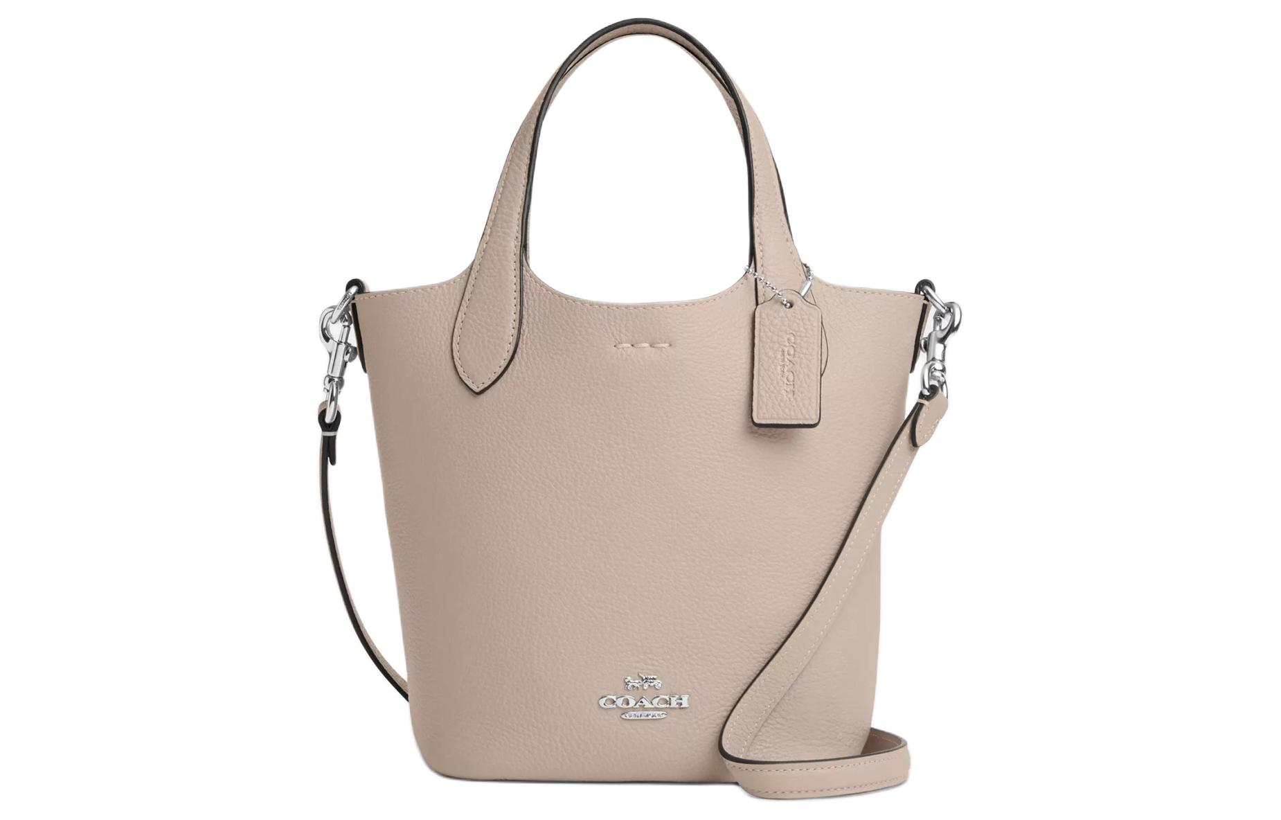 COACH Ханна Двусторонняя кожаная сумка ведро переносная кроссбоди через плечо малый размер женская бежевая 
COACH Ханна Двусторонняя кожаная сумка ведро переносная кроссбоди через плечо малый размер женская бежевая