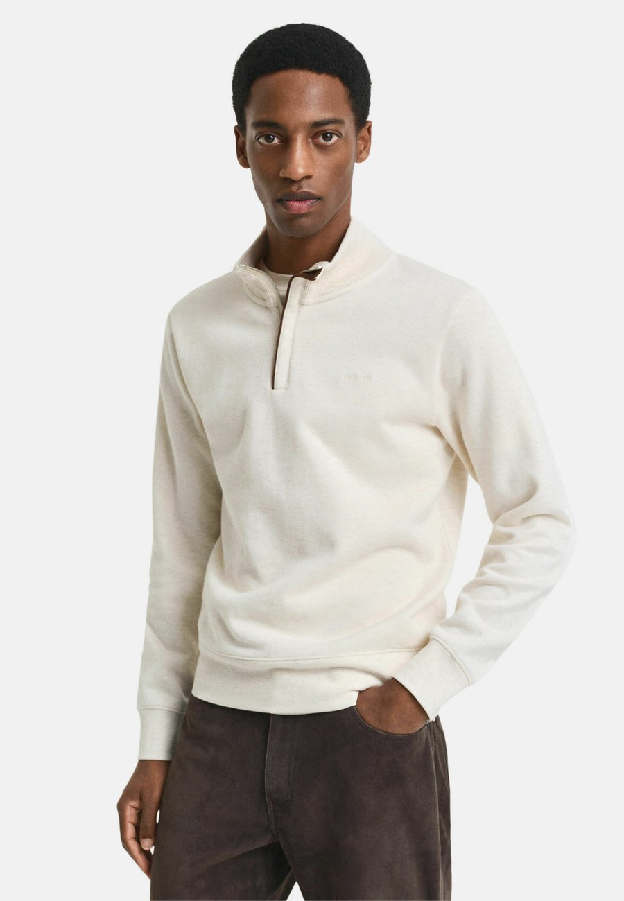 Толстовка GANT SACKER HALF-ZIP, Cream/Beige
Толстовка GANT SACKER HALF-ZIP, Cream/Beige
