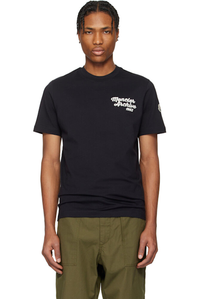 Футболка из хлопка с вышитым логотипом темно-синего цвета Moncler
Футболка из хлопка с вышитым логотипом темно-синего цвета Moncler