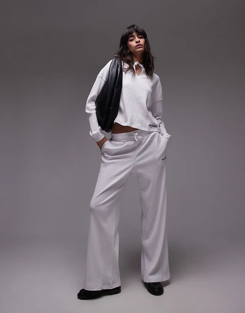 Белые брюки для дома с логотипом Tommy Hilfiger
Белые брюки для дома с логотипом Tommy Hilfiger