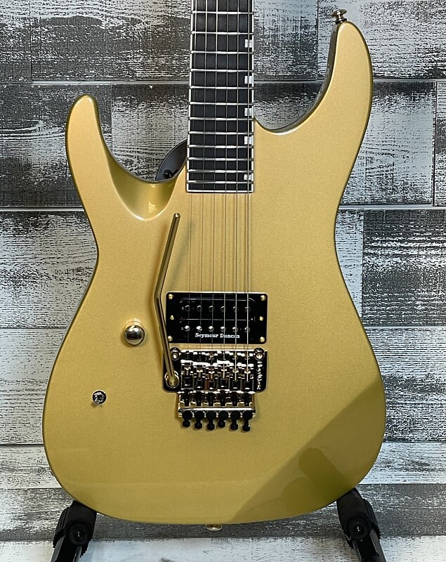 Электрогитара ESP LTD M-1 Custom '87 Left-Handed Guitar, Macassar Ebony Fretboard, Metallic Gold
Электрогитара ESP LTD M-1 Custom '87 Left-Handed Guitar, Macassar Ebony Fretboard, Metallic Gold