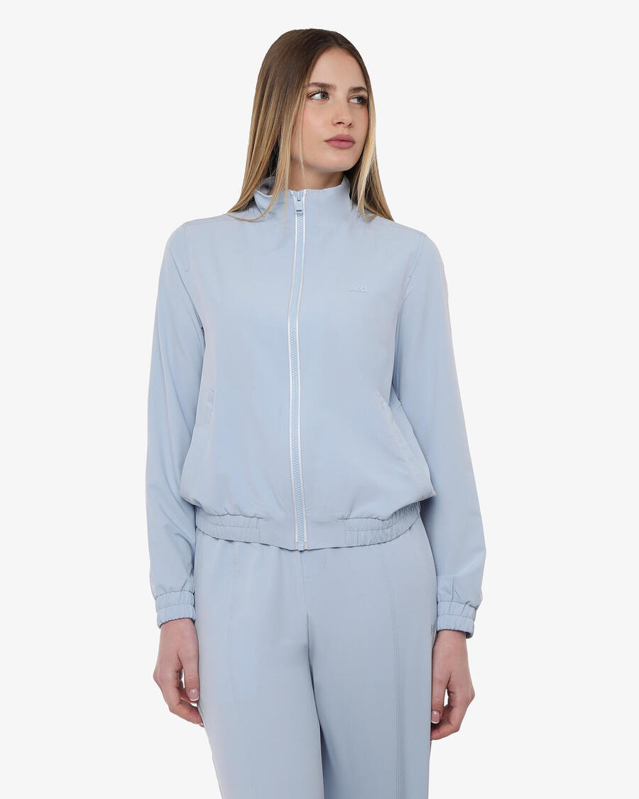 JAKED Женская толстовка светло-голубого цвета из синтетического материала для фитнеса.
JAKED Женская толстовка светло-голубого цвета из синтетического материала для фитнеса.