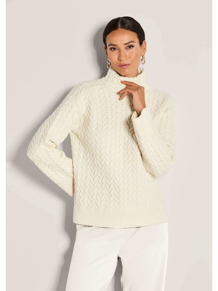 MADELEINE Элегантный хлопковый свитер с косами кремового цвета
MADELEINE Элегантный хлопковый свитер с косами кремового цвета