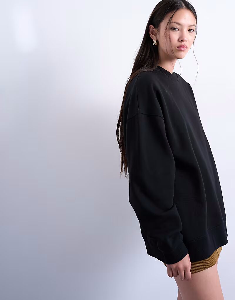 Удлиненный свободный свитер черного цвета Topshop
Удлиненный свободный свитер черного цвета Topshop