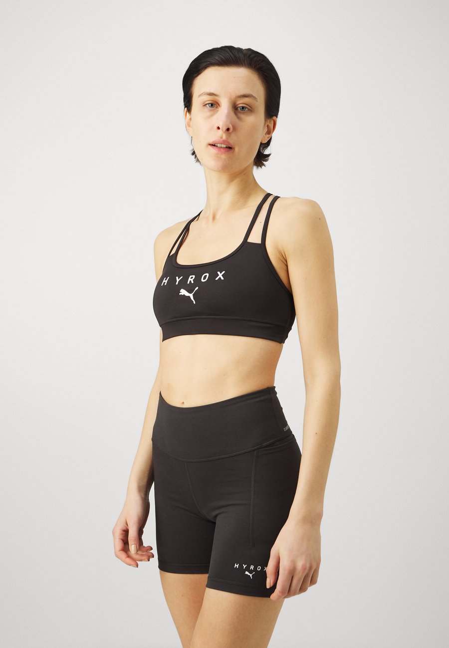 Бюстгальтер Puma HYROX MOVE STRAPPY BRA, Black
Бюстгальтер Puma HYROX MOVE STRAPPY BRA, Black