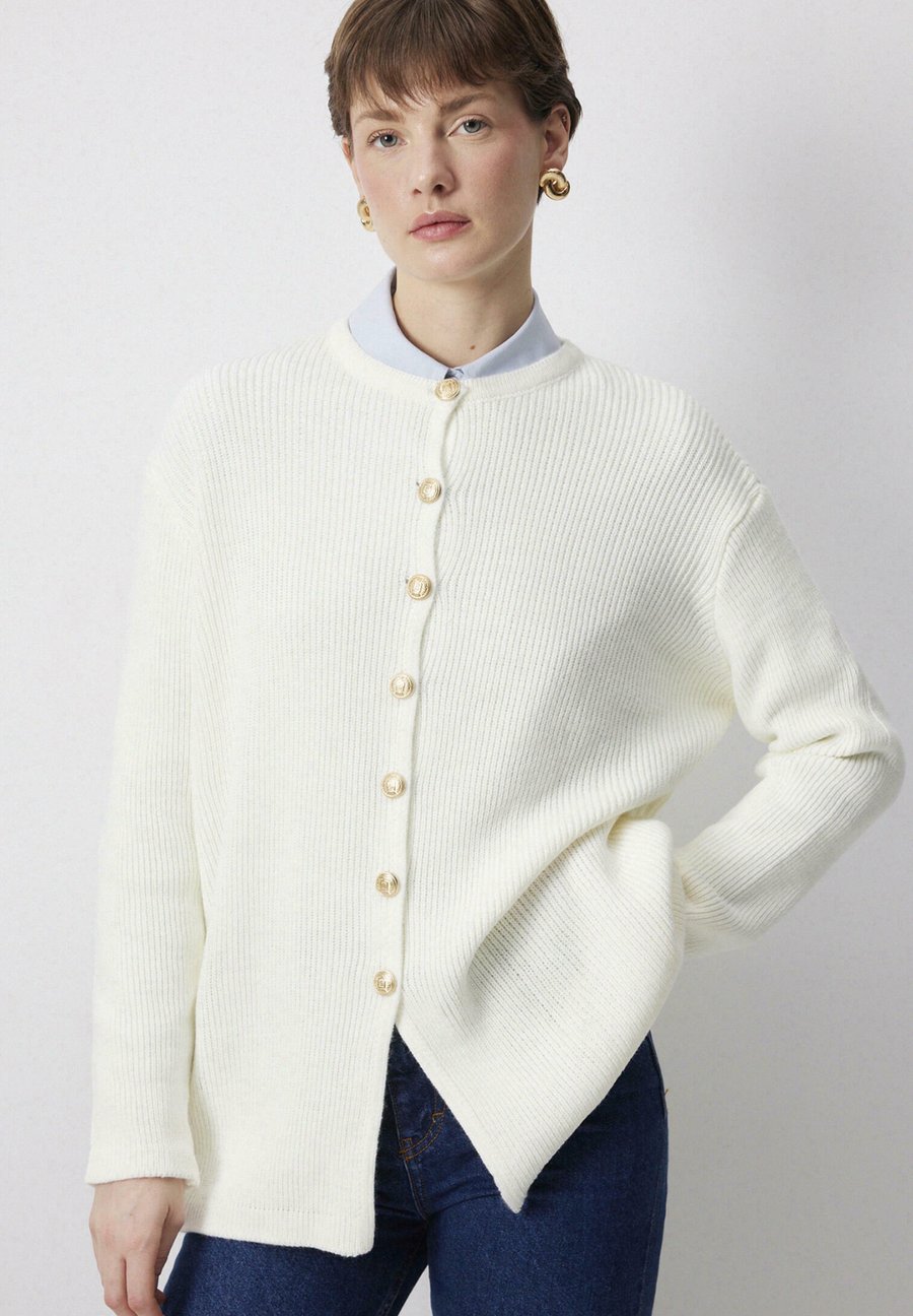 Кардиган Touché Privé Cardigan, Ecru/Beige
Кардиган Touché Privé Cardigan, Ecru/Beige