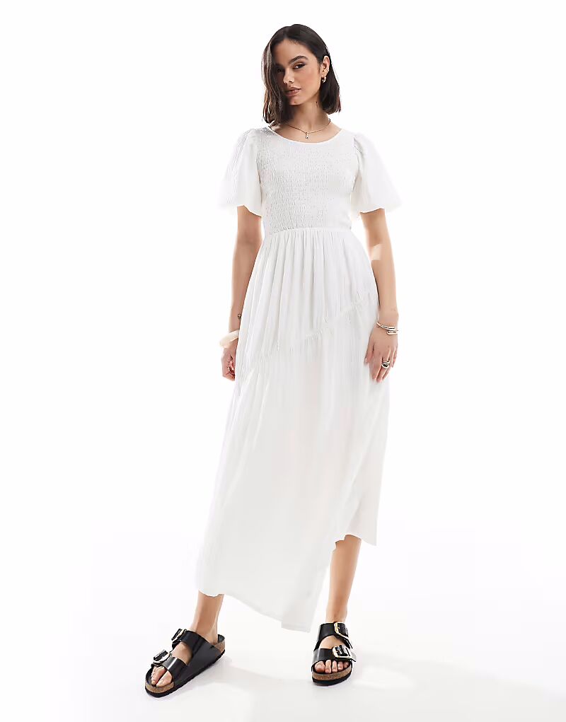 Потертое платье миди с рукавами-фонариками белого цвета Threadbare
Потертое платье миди с рукавами-фонариками белого цвета Threadbare