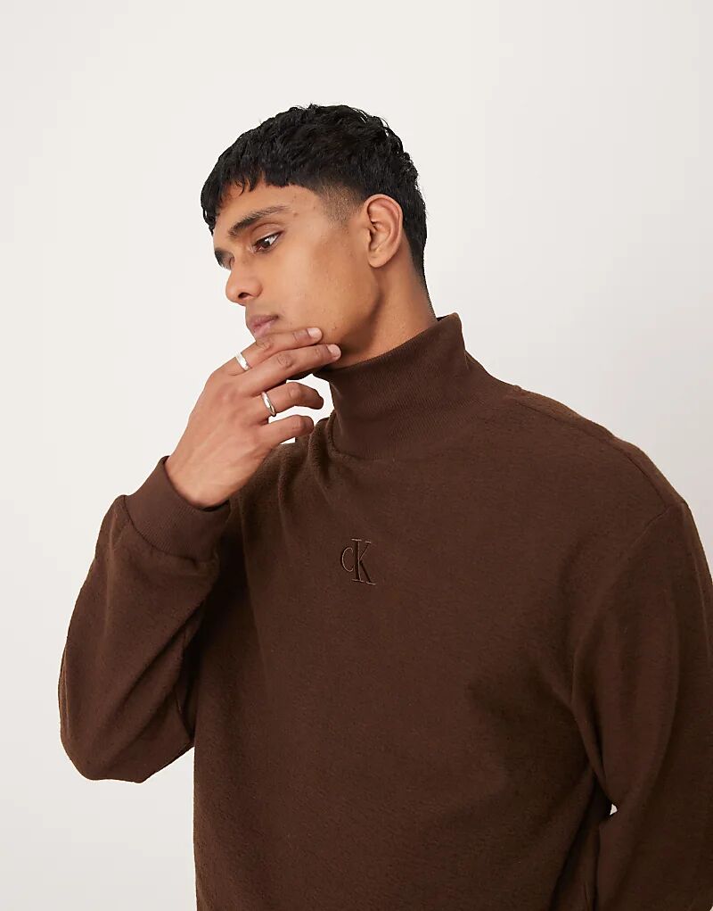 Уютный водолазный джемпер коричневого цвета - эксклюзивно для ASOS Calvin Klein Jeans
Уютный водолазный джемпер коричневого цвета - эксклюзивно для ASOS Calvin Klein Jeans