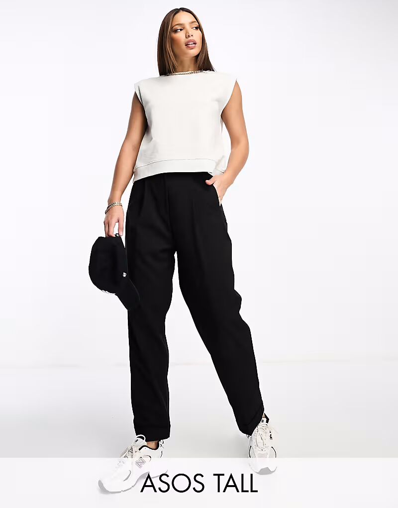 Высокие зауженные брюки с отворотом, черного цвета Asos Tall
Высокие зауженные брюки с отворотом, черного цвета Asos Tall