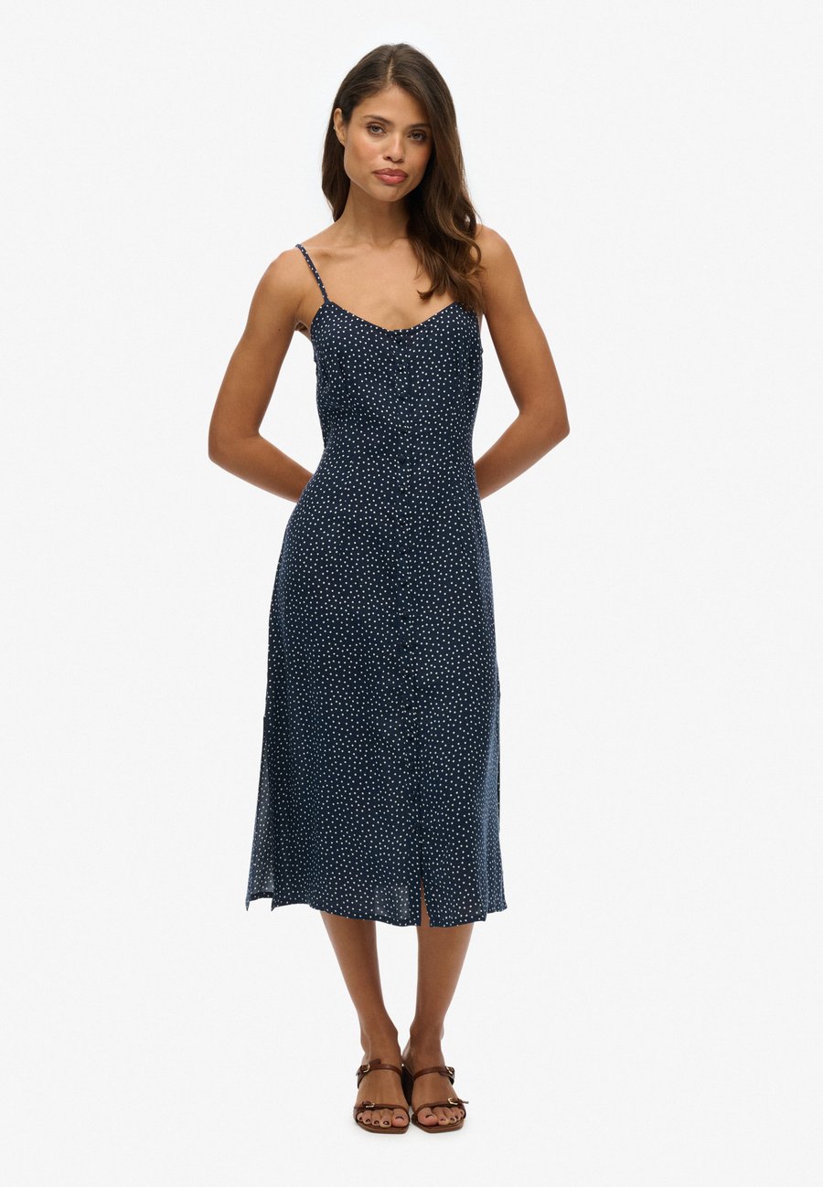 Платье Superdry & Co PRINT BUTTON CAMI MIDI, Alana Polka Dot/Blue
Платье Superdry & Co PRINT BUTTON CAMI MIDI, Alana Polka Dot/Blue