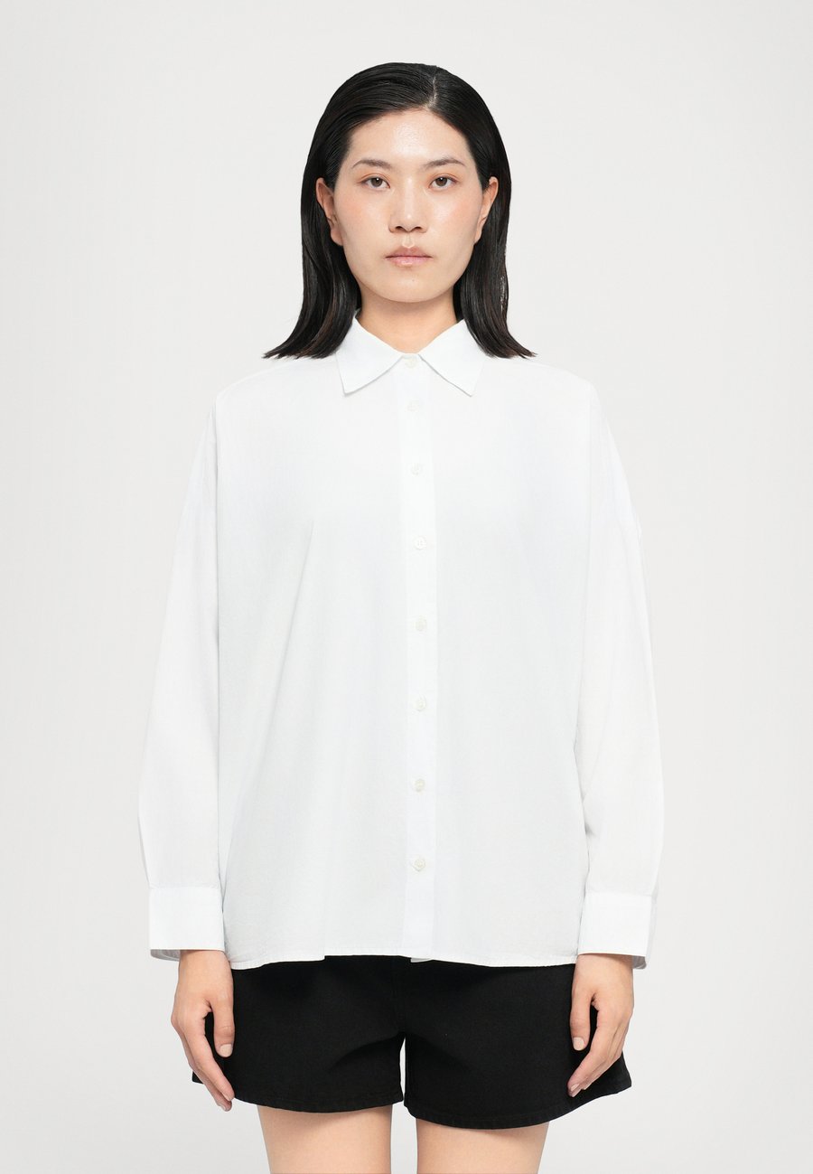 Блуза Agolde ROUX SHIRT, Hail/Off-White
Блуза Agolde ROUX SHIRT, Hail/Off-White