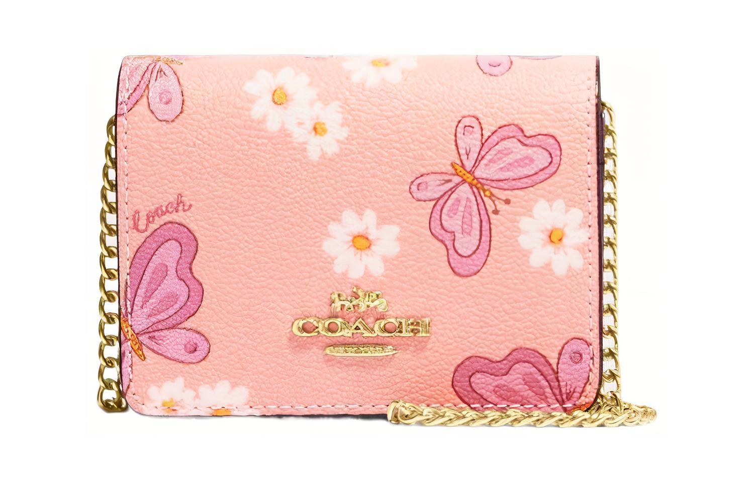 Кошелек на цепочке COACH
Кошелек на цепочке COACH