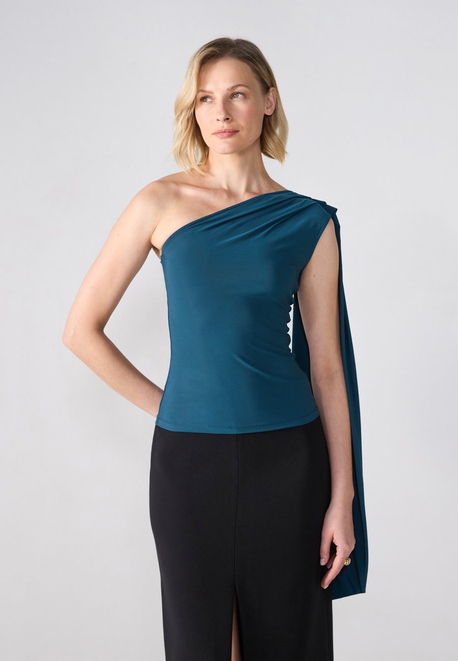 Топ Anna Field Top, Reflecting Pond/Dark Green
Топ Anna Field Top, Reflecting Pond/Dark Green