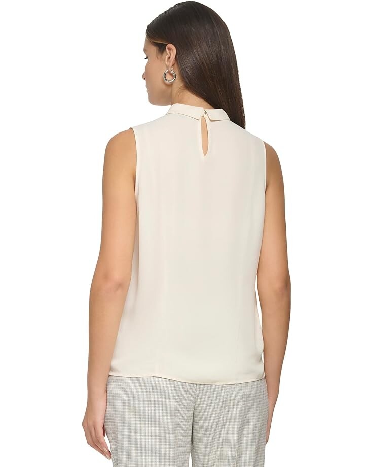 Блуза DKNY Sleeveless Twist Neck Blouse, цвет Buttercream
Блуза DKNY Sleeveless Twist Neck Blouse, цвет Buttercream