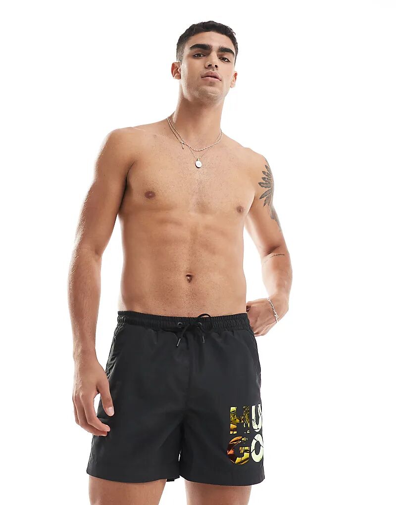 Плавки-шорты HUGO Swimwear черного цвета с голографическим логотипом BOSS Bodywear
Плавки-шорты HUGO Swimwear черного цвета с голографическим логотипом BOSS Bodywear