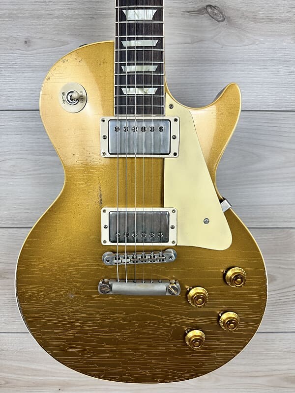 Электрогитара Gibson Custom 1957 Les Paul Goldtop Reissue Electric Guitar - Murphy Lab Ultra Heavy Aged Double Gold
Электрогитара Gibson Custom 1957 Les Paul Goldtop Reissue Electric Guitar - Murphy Lab Ultra Heavy Aged Double Gold