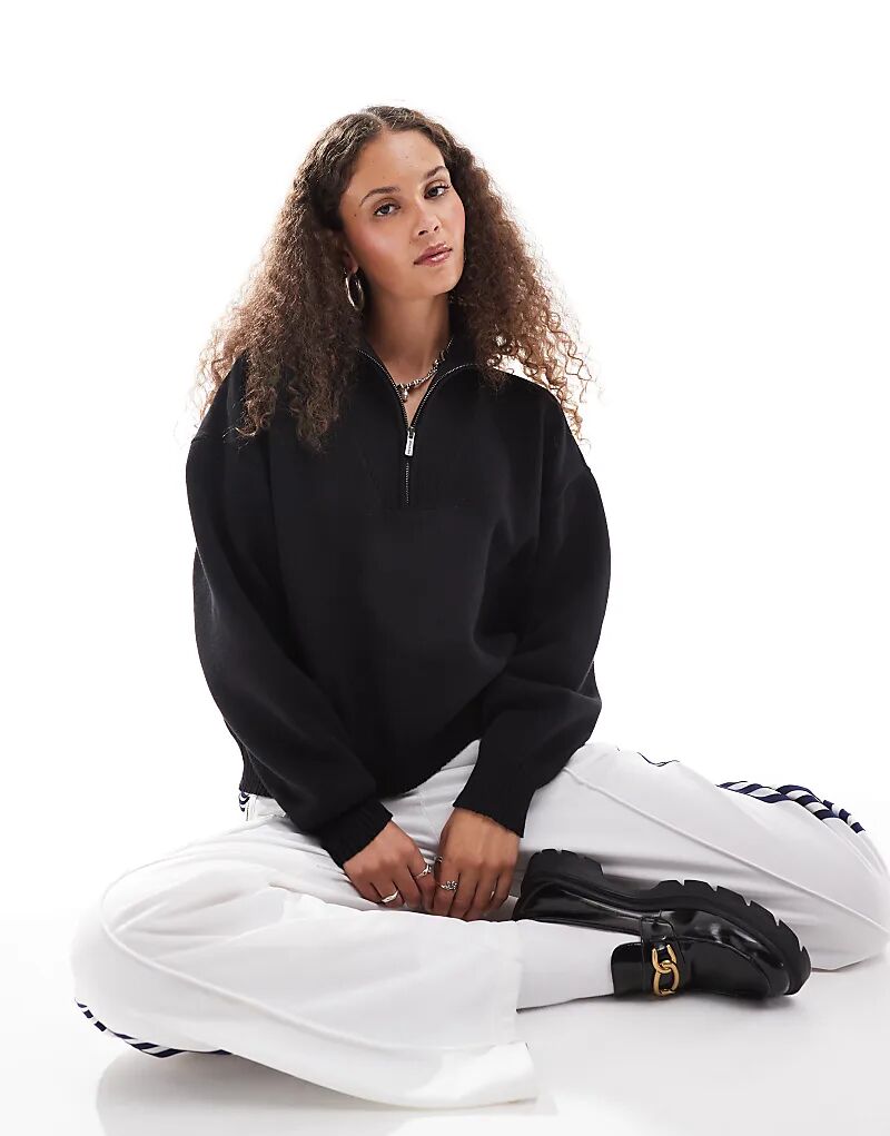 Сезонный свободный вязаный джемпер с четвертной молнией черного цвета Dickies
Сезонный свободный вязаный джемпер с четвертной молнией черного цвета Dickies