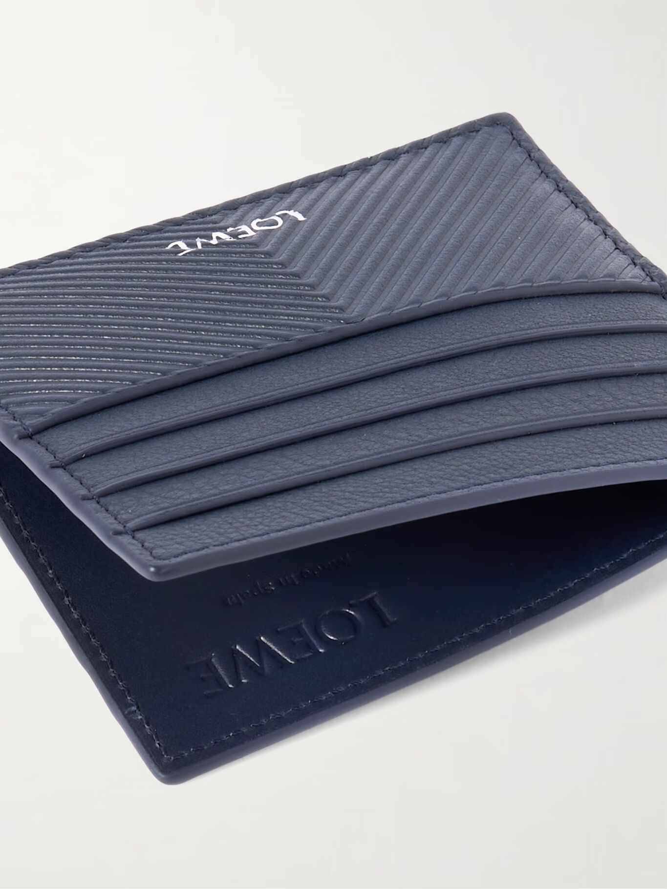 Кожаный держатель карт с тисненым логотипом LOEWE, темно-синий
Кожаный держатель карт с тисненым логотипом LOEWE, темно-синий