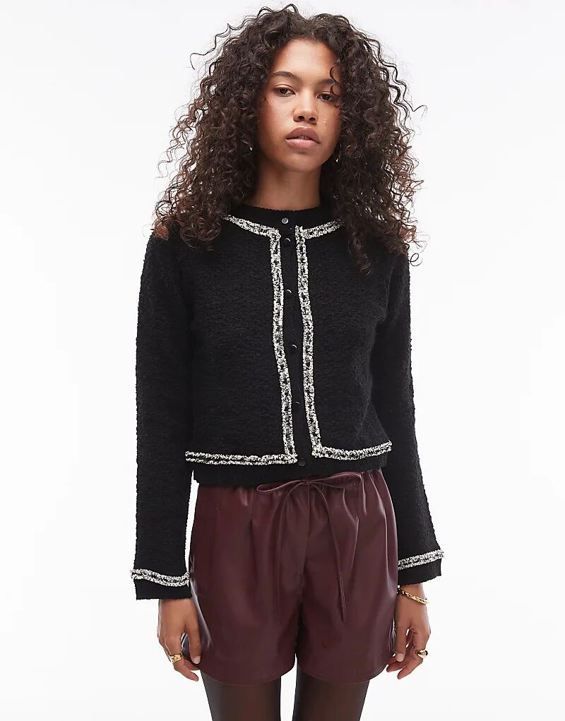 Вязаный кардиган с контрастной отделкой черного цвета Mango
Вязаный кардиган с контрастной отделкой черного цвета Mango