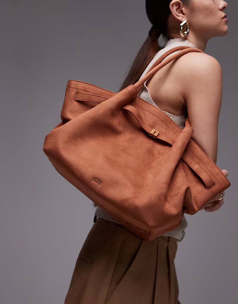 Сумка-тоут JW PEI Hana среднего размера из искусственной замши коричневого цвета
Сумка-тоут JW PEI Hana среднего размера из искусственной замши коричневого цвета