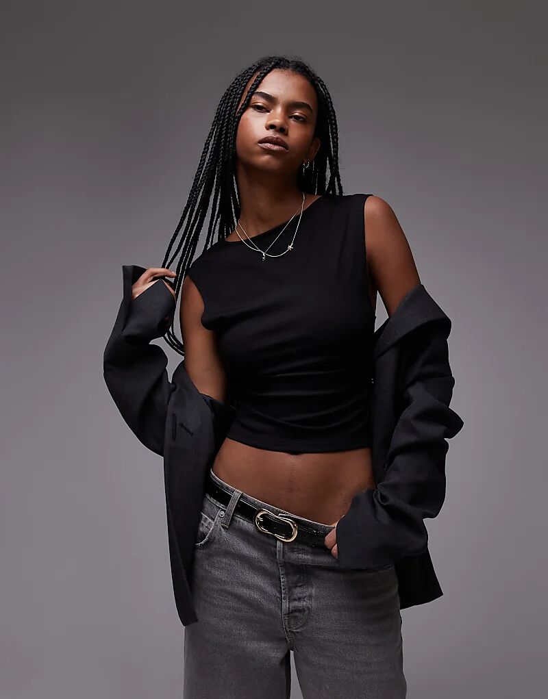 Футболка с открытой спиной черного цвета Mango
Футболка с открытой спиной черного цвета Mango