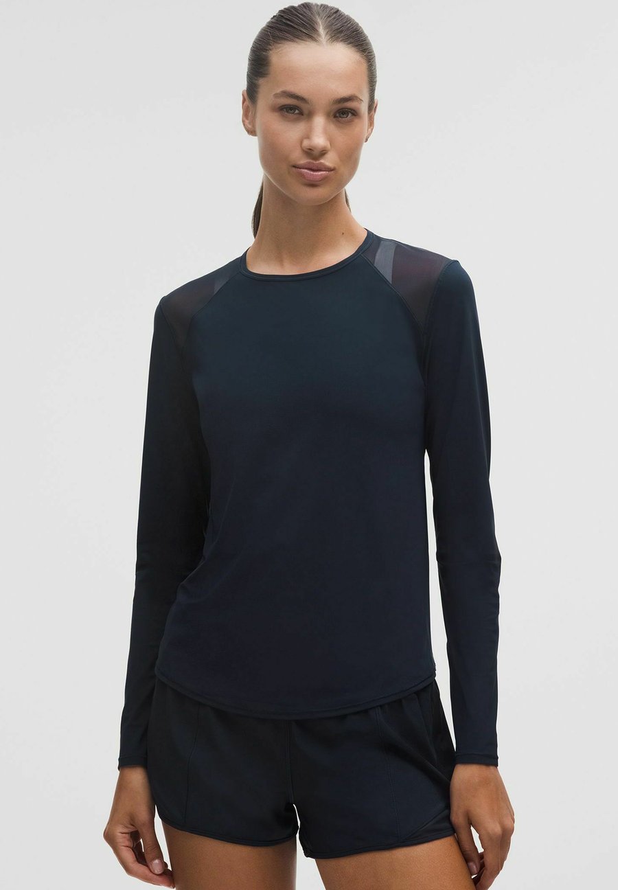 Топ lululemon SCULPT LONG SLEEVE, True Navy/Dark Blue
Топ lululemon SCULPT LONG SLEEVE, True Navy/Dark Blue