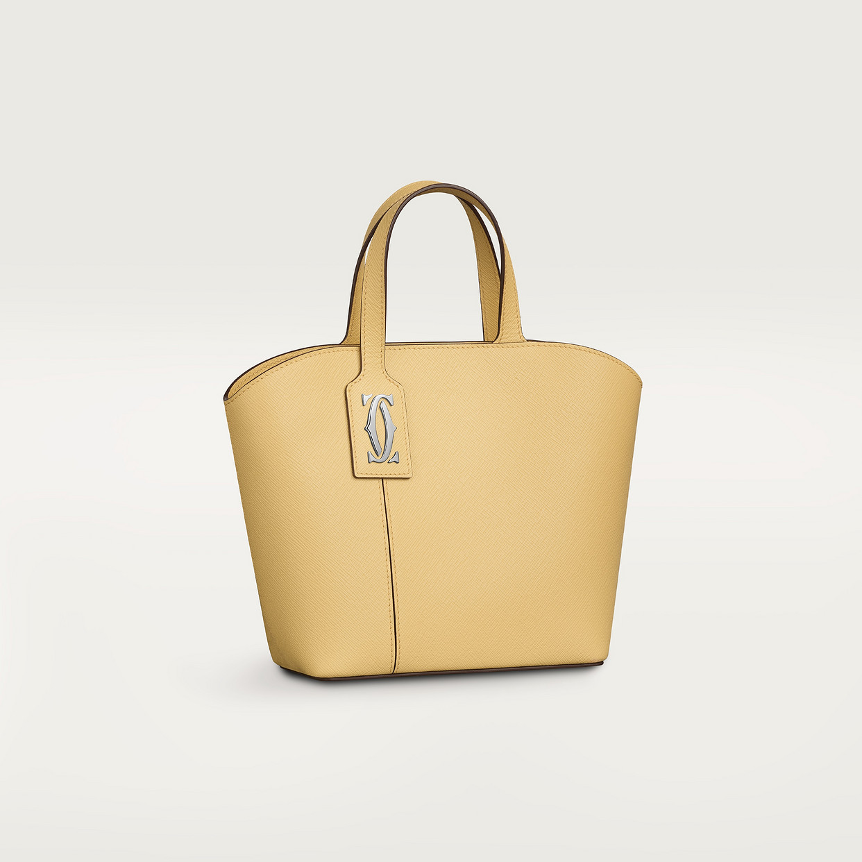 Женская сумка-тоут Cartier Sac cabas mini modèle, C de Cartier, текстурированная телячья кожа цвета мимозы
Женская сумка-тоут Cartier Sac cabas mini modèle, C de Cartier, текстурированная телячья кожа цвета мимозы