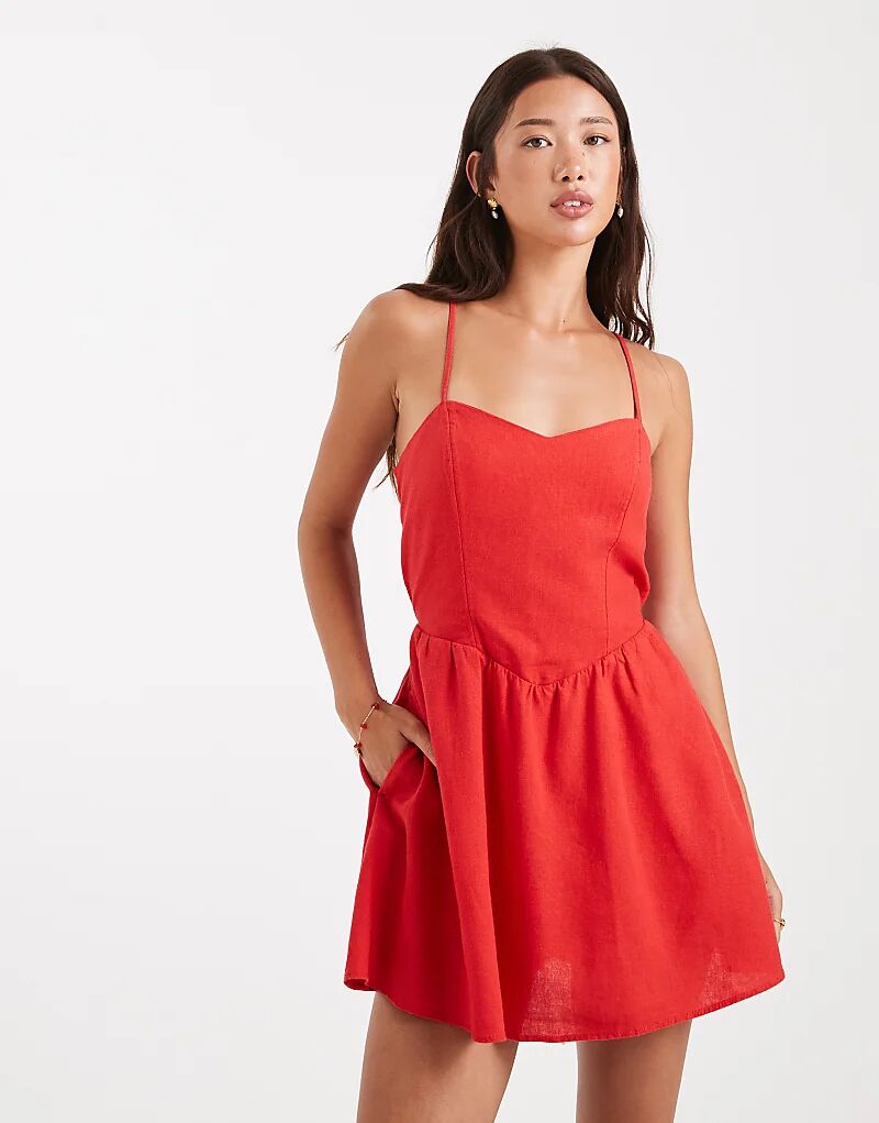 Мини-платье Hollister из льна с заниженной талией и тонкими бретельками красного цвета
Мини-платье Hollister из льна с заниженной талией и тонкими бретельками красного цвета