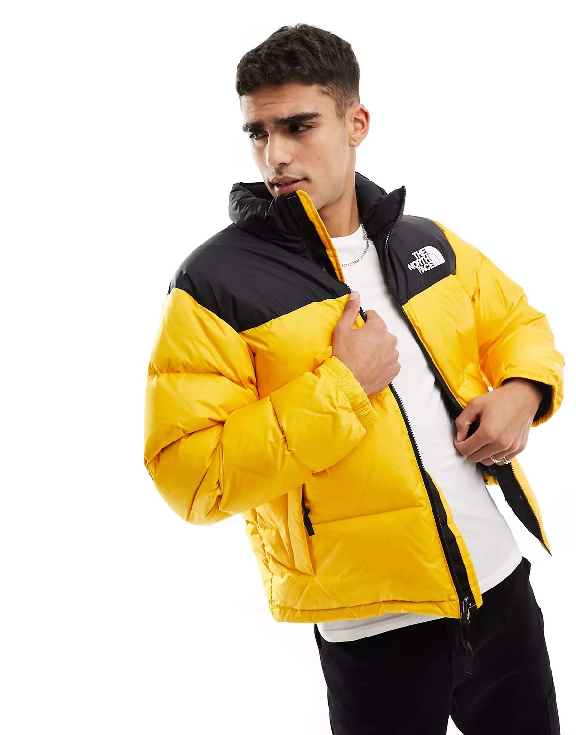 Желто-черный пуховик The North Face '96 Retro Nuptse
Желто-черный пуховик The North Face '96 Retro Nuptse