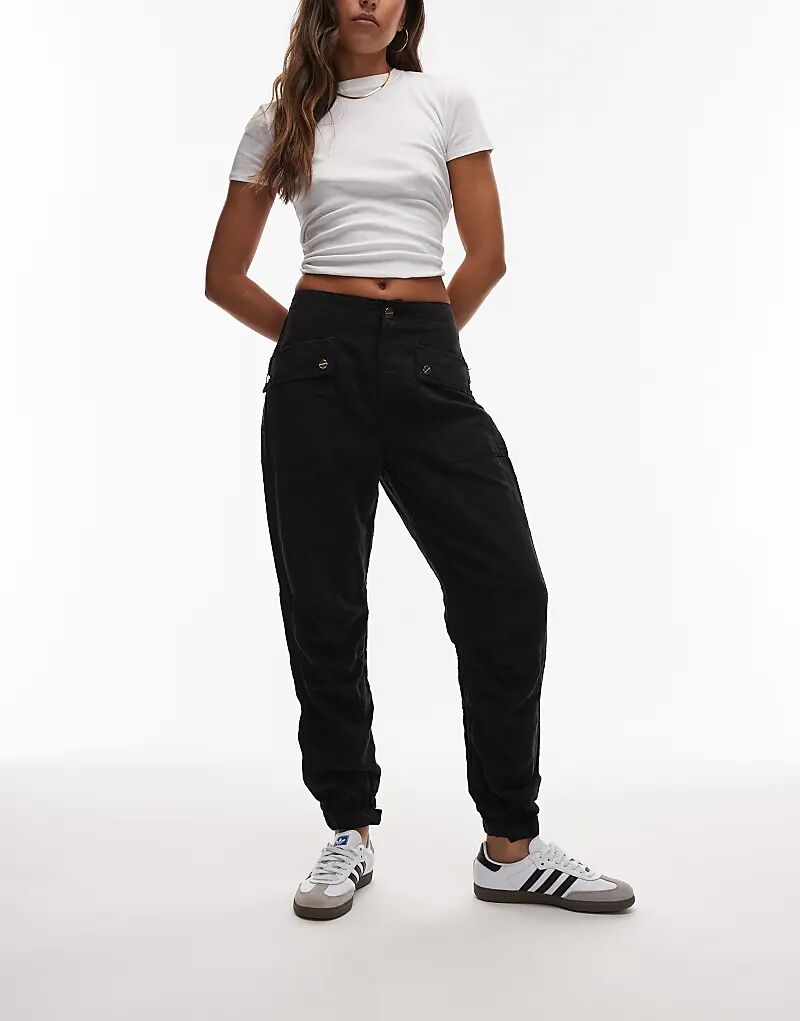 Темно-синие брюки Allsaints Val - MBLUE
Темно-синие брюки Allsaints Val - MBLUE