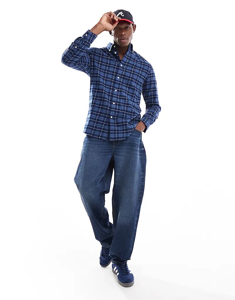 Рубашка в клетку с начесом темно-синего цвета Tommy Hilfiger
Рубашка в клетку с начесом темно-синего цвета Tommy Hilfiger