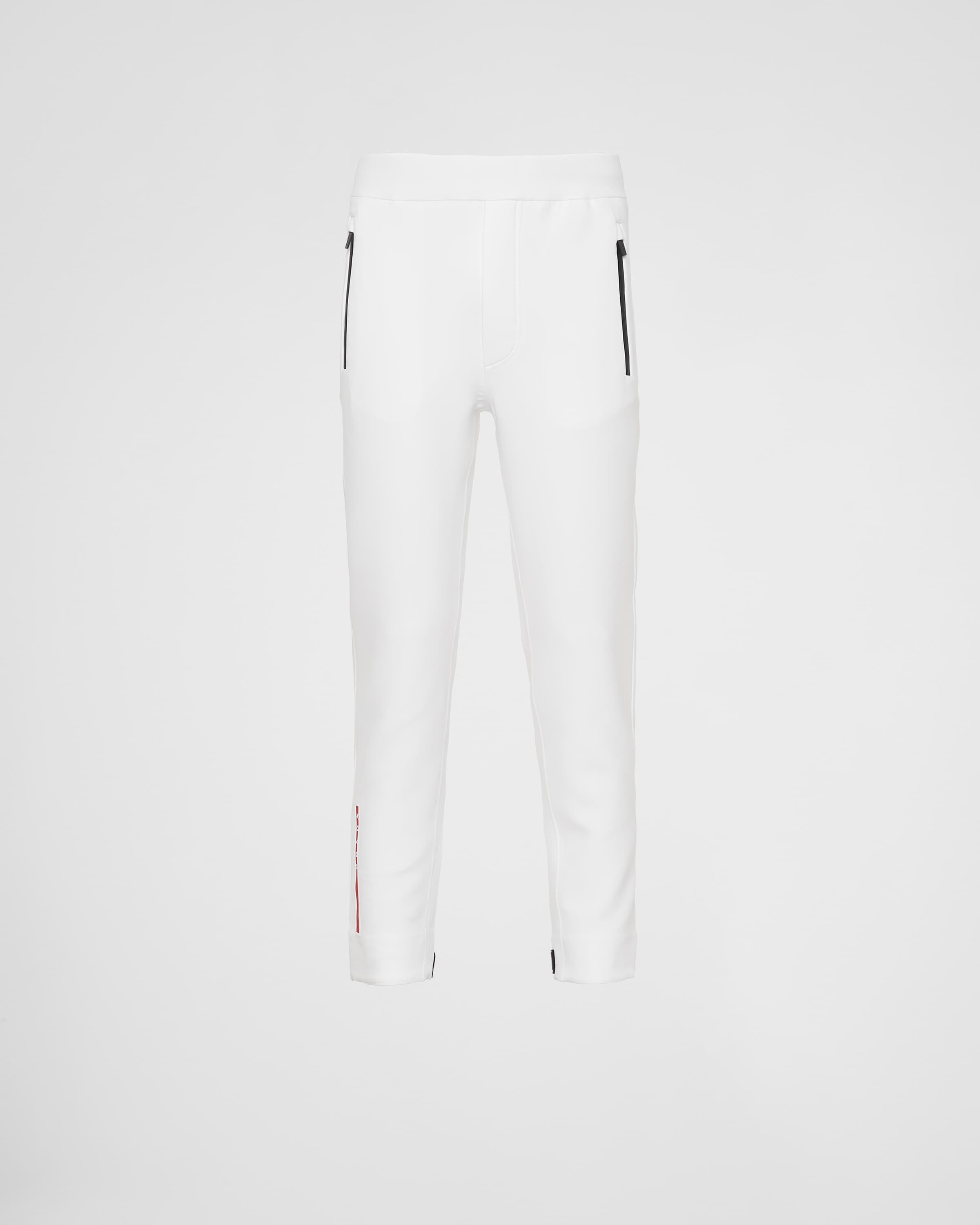 Джоггеры из технической ткани с термозапаянными проклеенными швами Prada, белая
Джоггеры из технической ткани с термозапаянными проклеенными швами Prada, белая