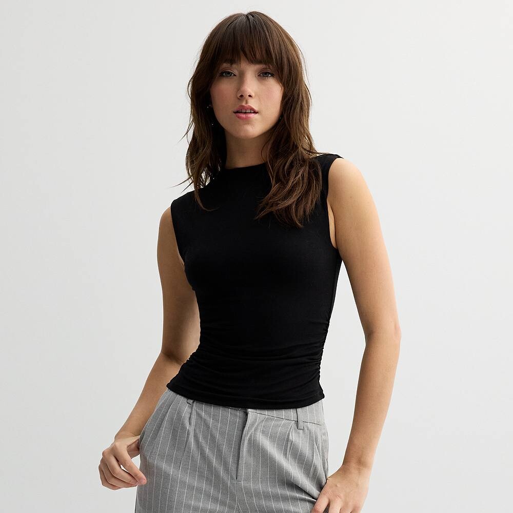 Юниорский топ SO без рукавов с воротником-стойкой и рюшами, черный
Юниорский топ SO без рукавов с воротником-стойкой и рюшами, черный