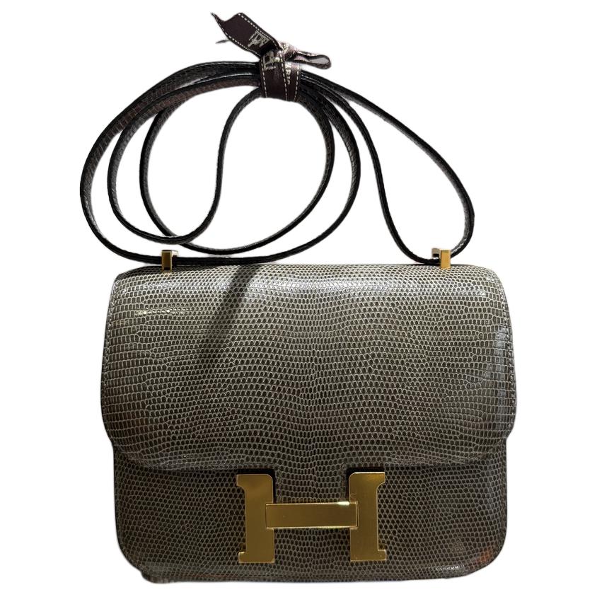 Сумка кросс-боди Constance Lizard Skin, мини-сумка через плечо для женщин 84 Gris Foncé Dark Gray HERMES
Сумка кросс-боди Constance Lizard Skin, мини-сумка через плечо для женщин 84 Gris Foncé Dark Gray HERMES