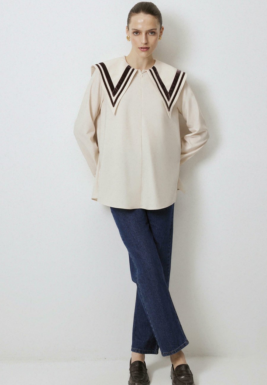 Блуза Touché Privé WIDE COLLAR, Cream/Beige
Блуза Touché Privé WIDE COLLAR, Cream/Beige
